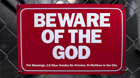 Beware of the God fence sign