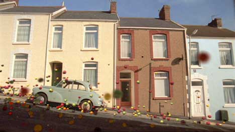 Fruit bounces past houses in Swansea