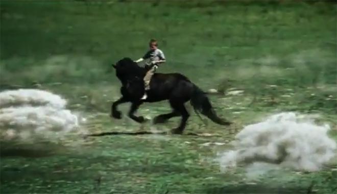 Boy on horse rides through sheep clouds for Land Rover Go Beyond TV ad