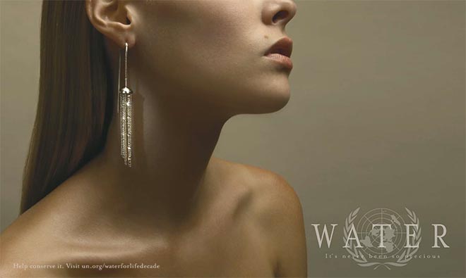 Woman wearing water earring for World Water Decade