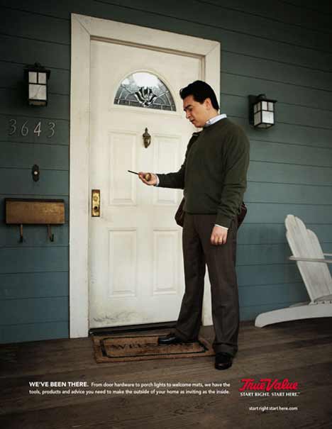 Man looks at his door with concern