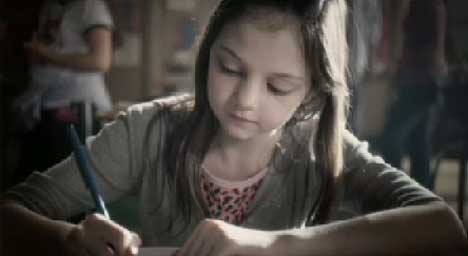 Girl doodles a heart in JC Penney TV ad