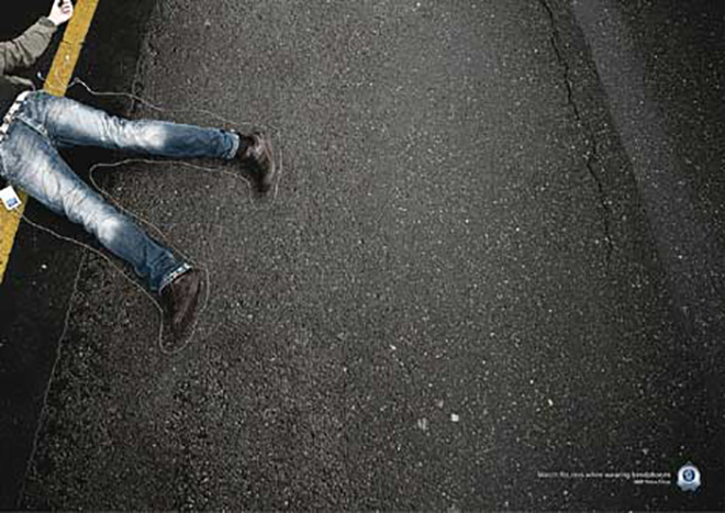 Headphones cable used to map the legs in NSW road safety advertisement