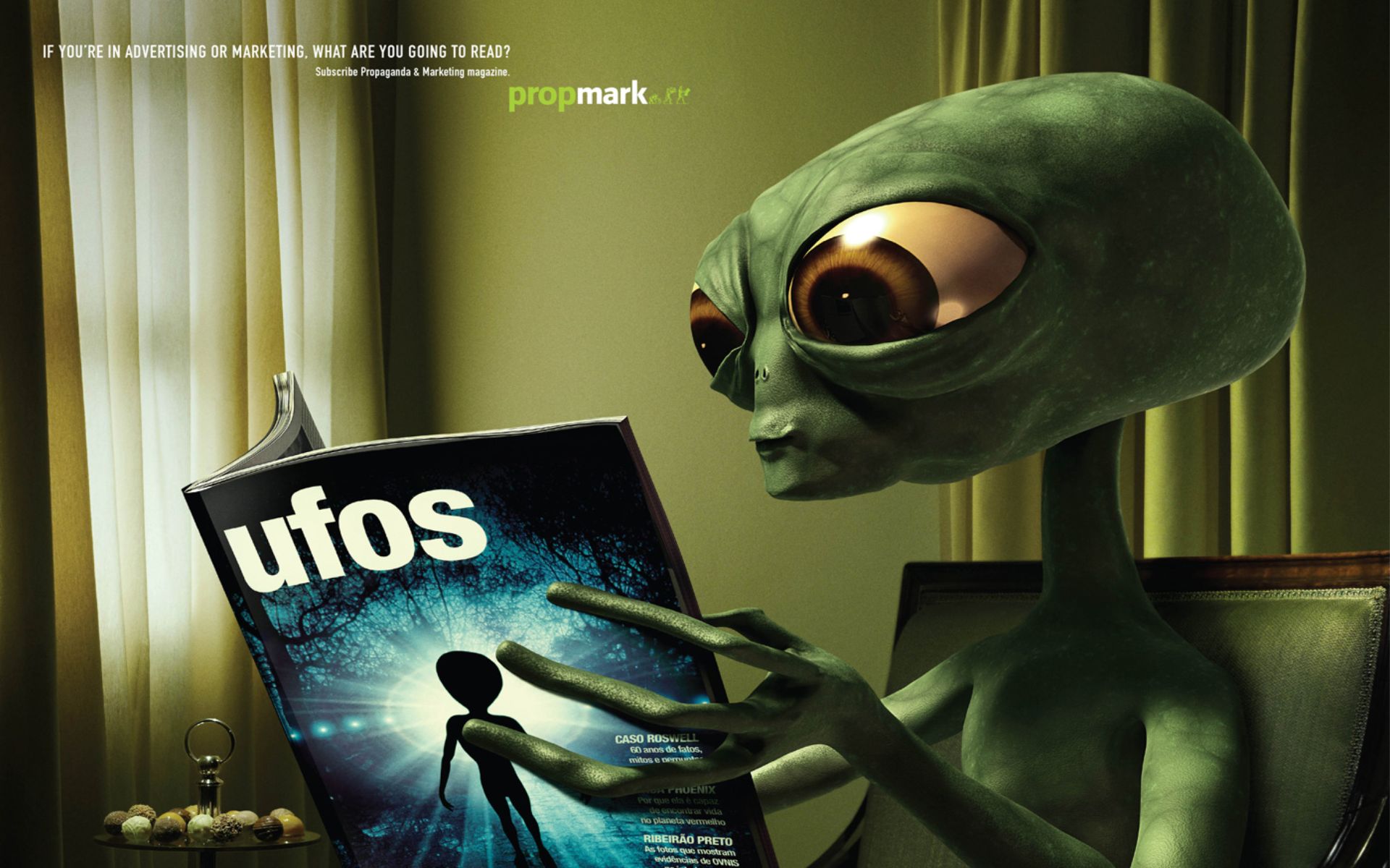 Alien reads Aliens magazine in PropMark advertisement