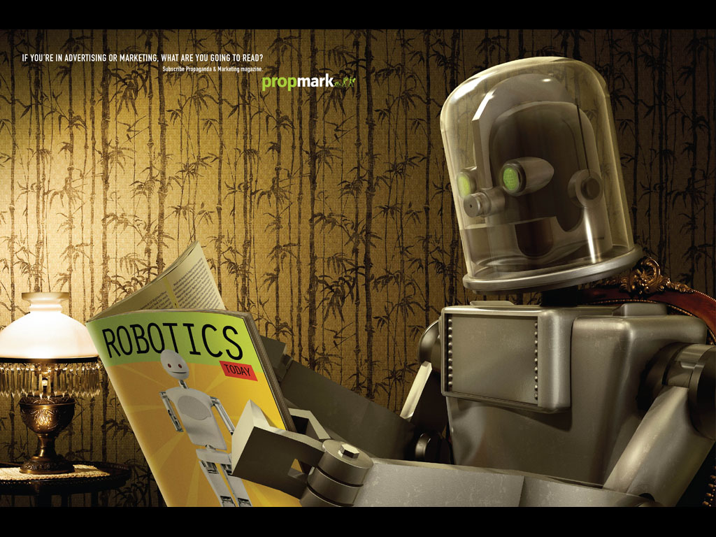 Robot reads Robotics magazine in PropMark advertisement