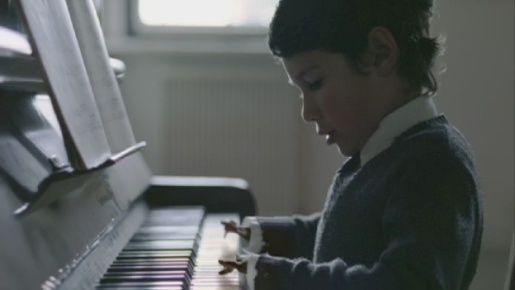 Herringbone Henri plays piano as a child