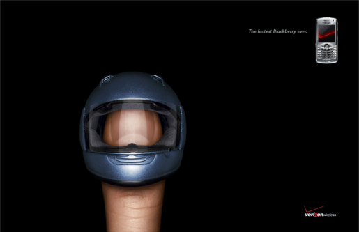 Helmeted thumb in Verizon Blackberry print advertisement