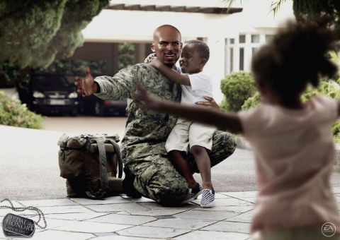 Soldier hugs family in Medal of Honor print ad