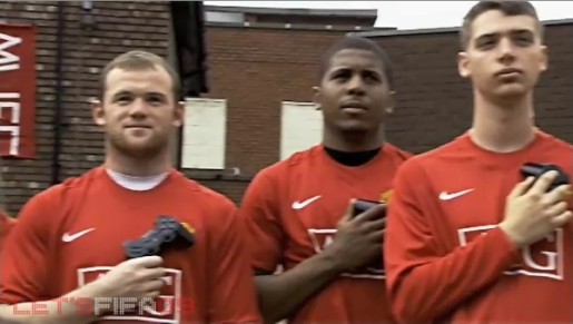 Wayne Rooney and fellow gamers hold consoles in FIFA 09 commercial